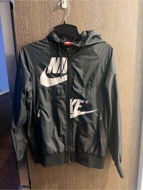Nike Black Hooded Windbreaker Jacket with White Swoosh Logos